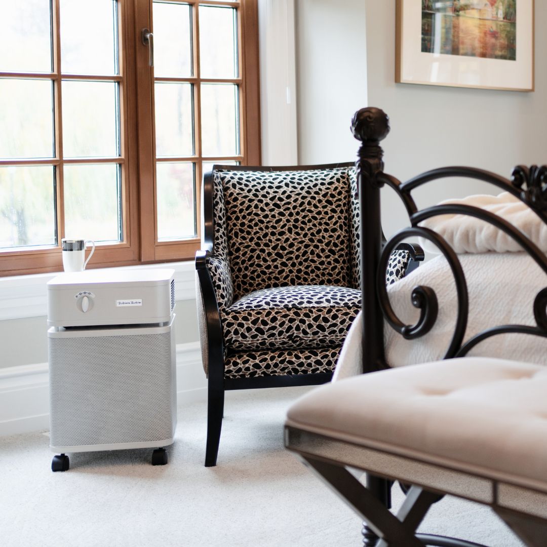 Austin Air Bedroom Machine air purifier, Sandstone, in a bedroom